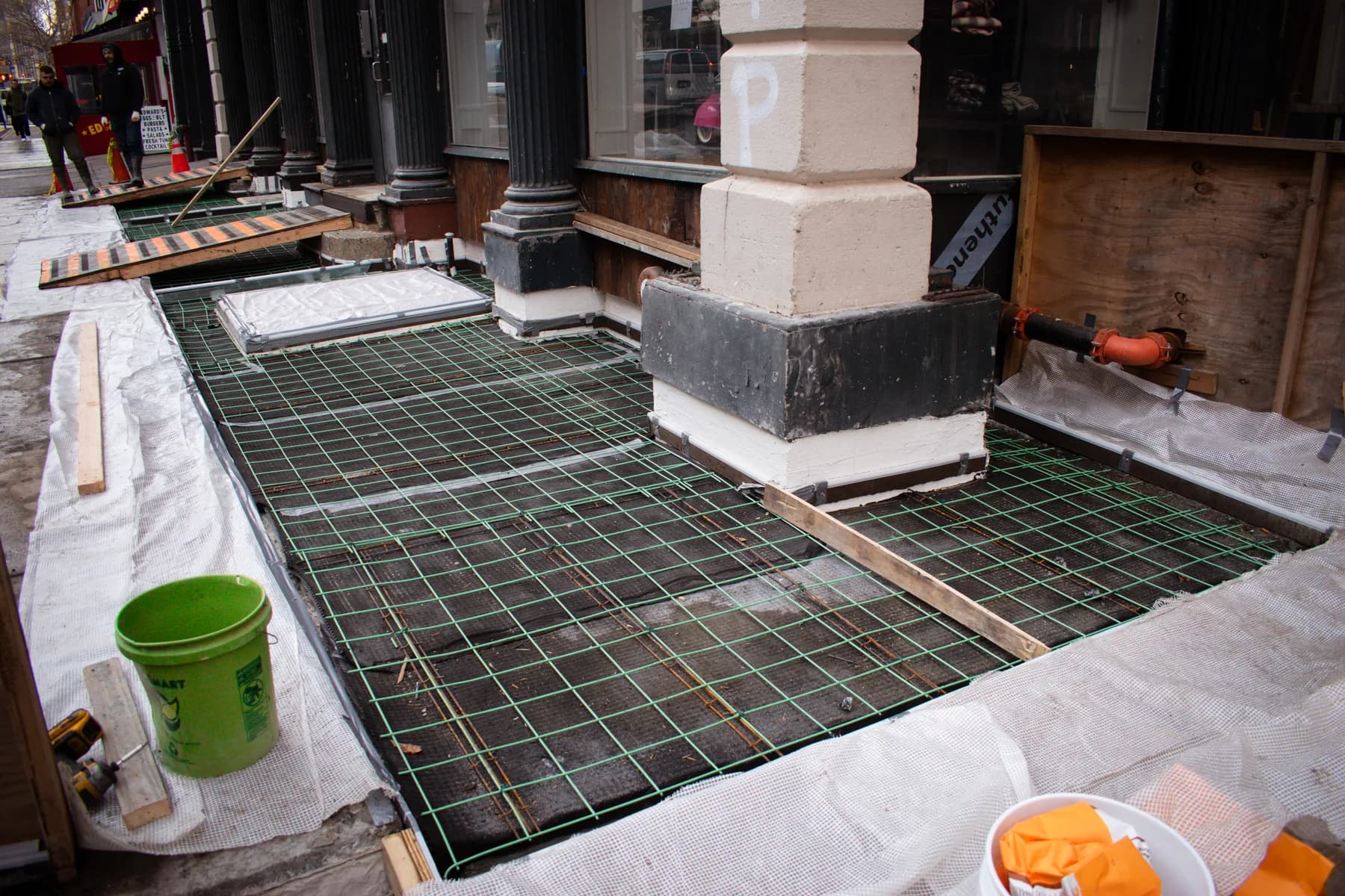 Reinforcing grid prepared around the 140 Broadway entrance columns