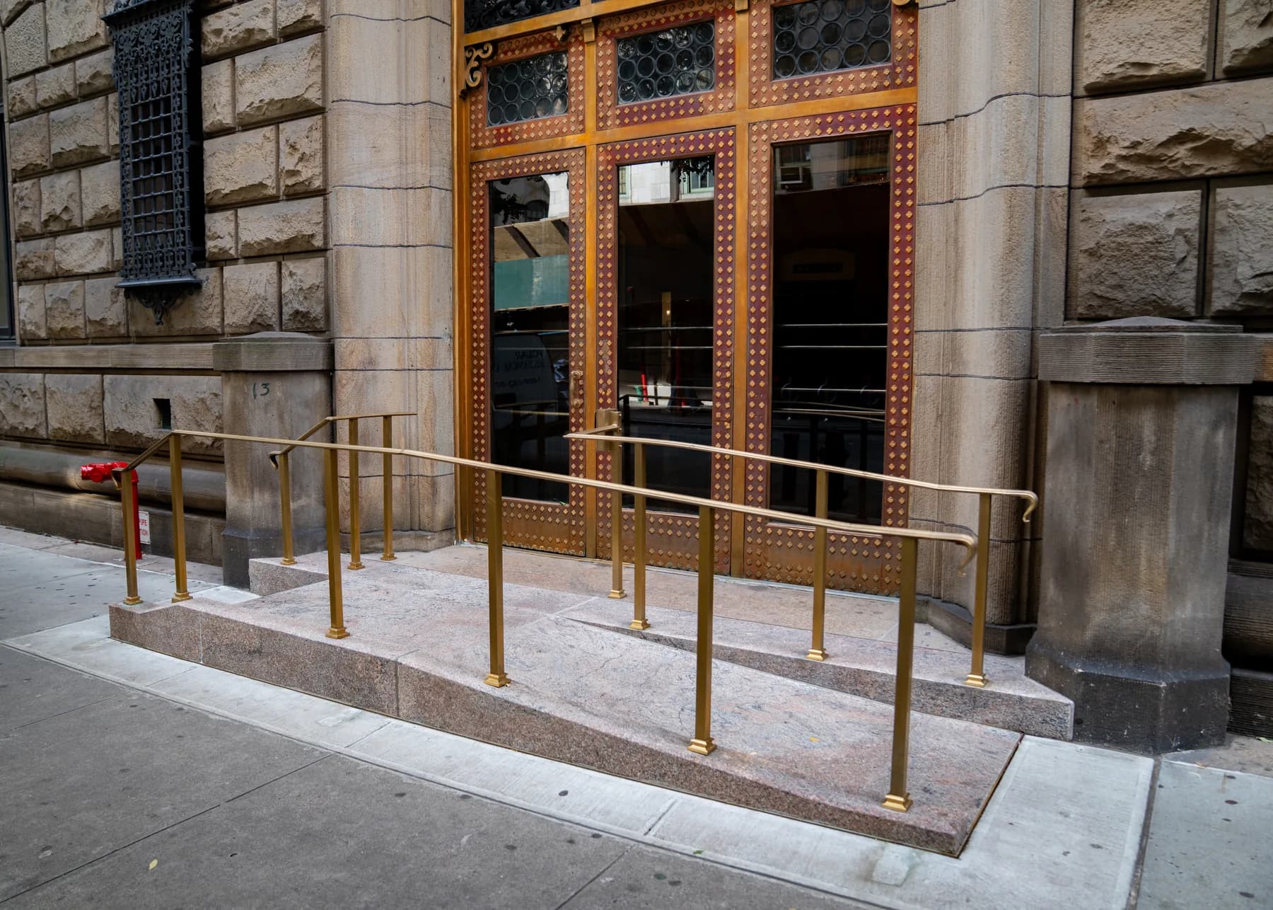 Completed accessibility ramp and railings at 4 Lexington Avenue
