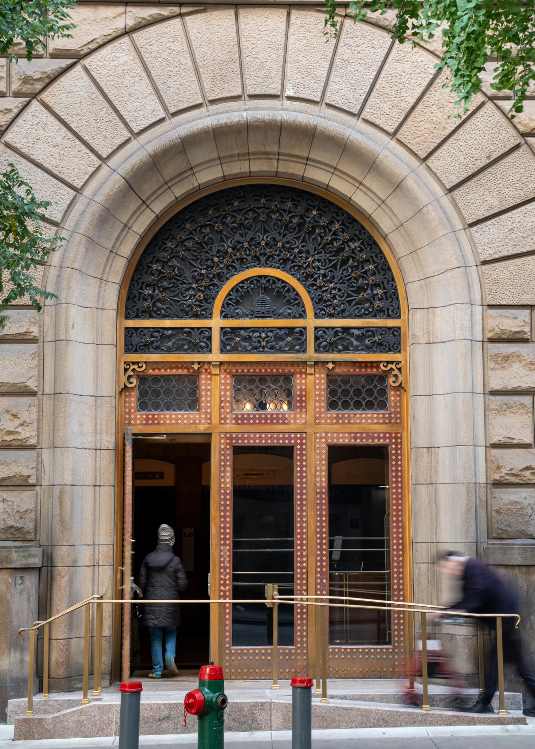 Full-height view of the monumental doorway at 4 Lexington Avenue